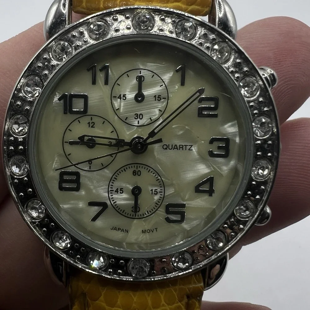 CG Women's Quartz Watch Rhinestone Bezel MOP Dial Plastic Band Needs New Battery